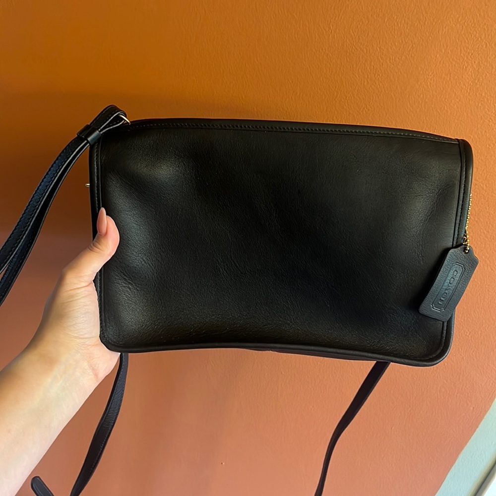Coach skinny convertible clutch.